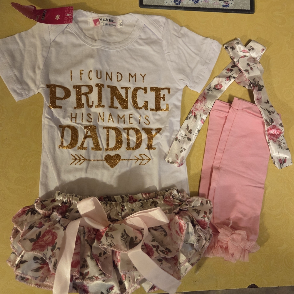 White and Gold Graphic Tee with Floral Shorts and Pink Leggings